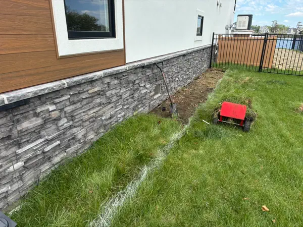 Clean Stone Base & Lawn Edge
